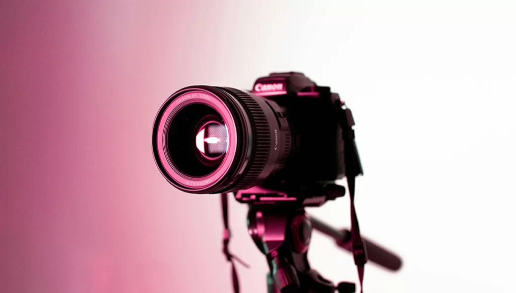 shot of camera under creative colored lighting