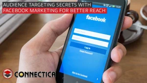 hand holding a mobile phone with facebook screen displayed