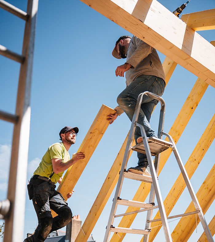 men working on roof cropped smaller
